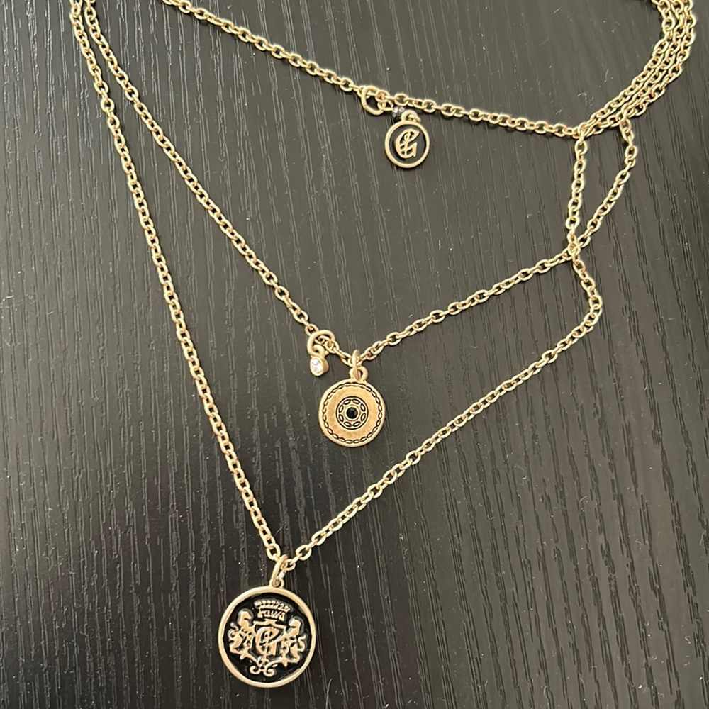 Guess black and gold medallion layered necklace